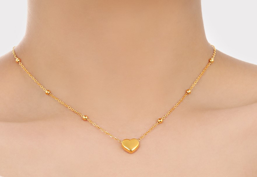 Goudkleurige ketting met schattige hartjes hanger